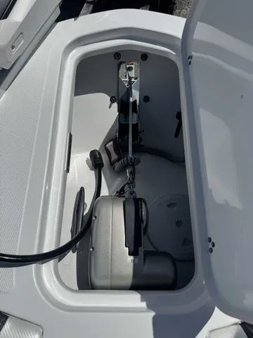 Slide: The Image of Wellcraft Fisherman 243 XB 2026 anchor locker detail view. - 28