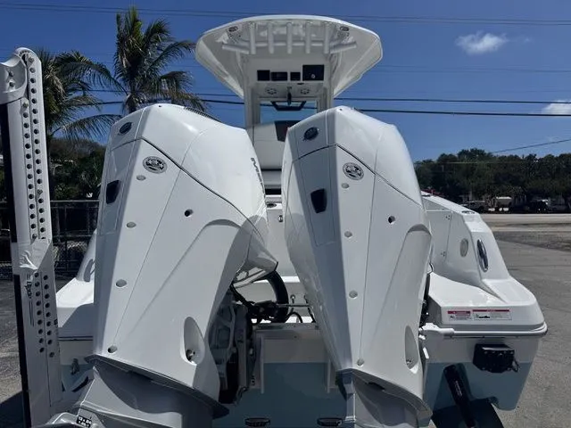 Slide: The Image of 2026 Wellcraft Fisherman 243 XB with dual outboard engines. - 4