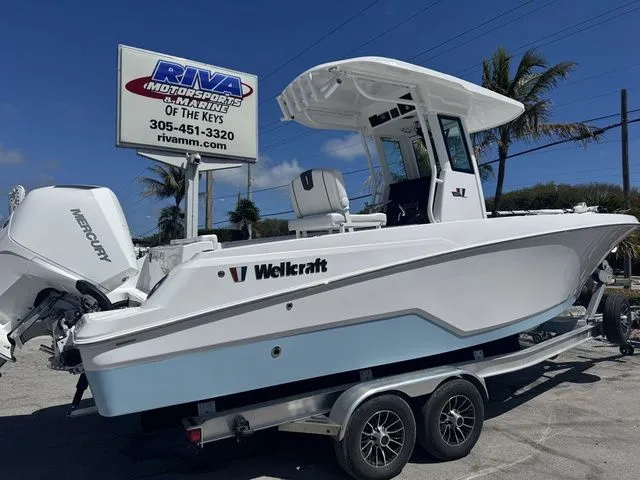 Slide: The Image of 2026 Wellcraft Fisherman 243 XB boat on trailer. - 5