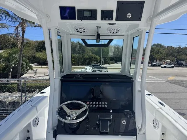 Slide: The Image of Interior view of 2026 Wellcraft Fisherman 243 XB boat cockpit. - 9