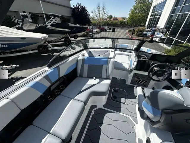 Slide: The Image of Interior of 2025 Malibu Wakesetter 23 MXZ with luxurious features. - 11