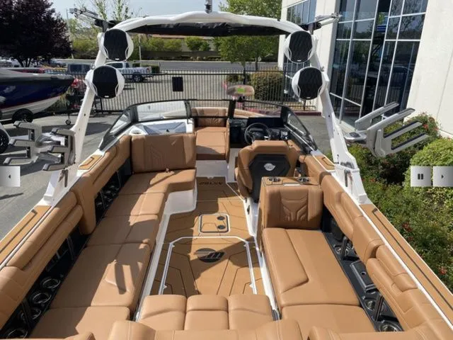 Slide: The Image of Interior of 2025 Malibu Wakesetter 25 LSV with luxurious seating. - 9