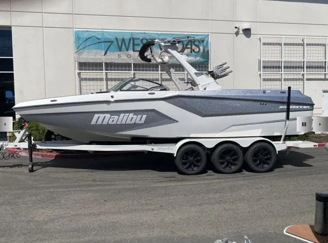 Slide: The Image of 2025 Malibu Wakesetter 24 MXZ boat on trailer, side view. - 4