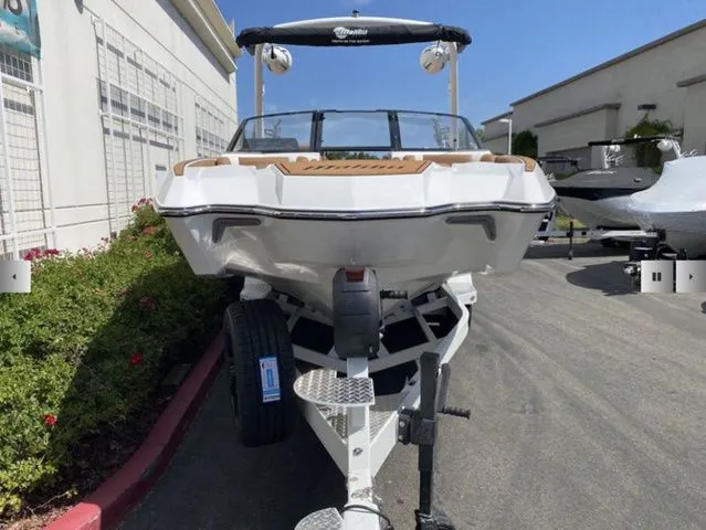 Slide: The Image of 2025 Malibu Wakesetter 24 MXZ on trailer, front view. - 5