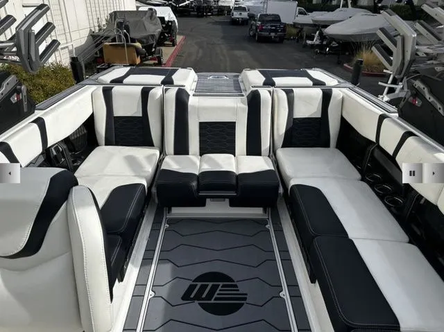 Slide: The Image of Interior of 2025 Malibu Wakesetter 23 MXZ with luxurious seating. - 10