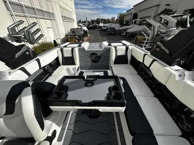 Slide: The Image of Interior of 2025 Malibu Wakesetter 23 MXZ with luxurious features. - 13