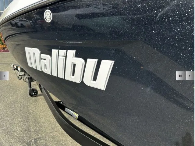 Slide: The Image of 2025 Malibu Wakesetter 23 MXZ boat, close-up of logo. - 4