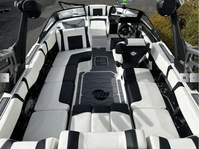 Slide: The Image of Interior of 2025 Malibu Wakesetter 23 MXZ with luxurious seating. - 6