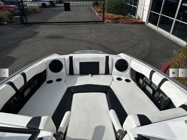 Slide: The Image of Interior of 2025 Malibu Wakesetter 23 MXZ with luxurious seating. - 9