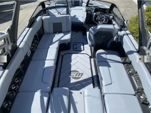 Slide: The Image of Interior of 2025 Malibu Wakesetter 23 LSV with gray seating. - 10