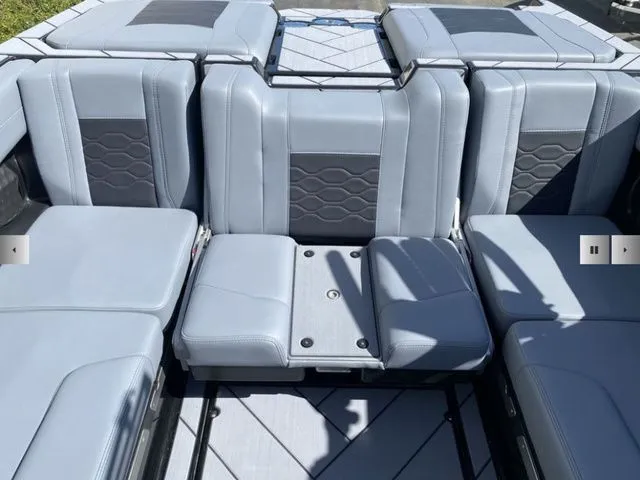 Slide: The Image of Interior of 2025 Malibu Wakesetter 23 LSV with gray leather seats. - 11