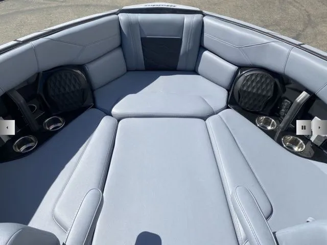 Slide: The Image of 2025 Malibu Wakesetter 23 LSV interior with gray upholstery. - 12