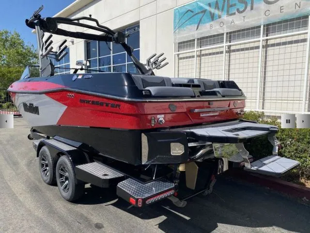 Slide: The Image of 2025 Malibu Wakesetter 23 LSV boat on trailer outside boat center. - 9