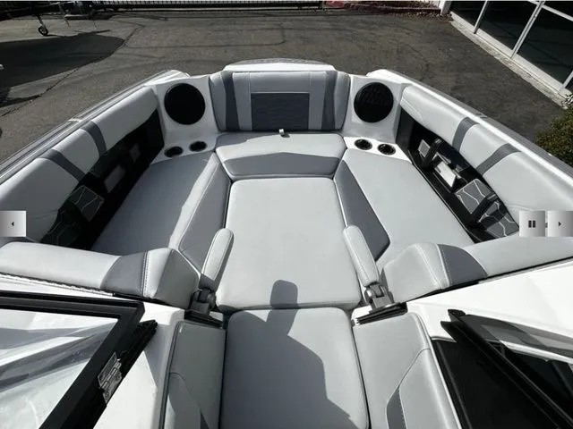 Slide: The Image of Interior of 2025 Malibu Wakesetter 22 MXZ with gray upholstery. - 13