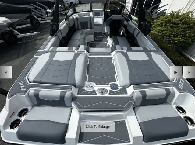 Slide: The Image of Interior of 2025 Malibu Wakesetter 22 MXZ with gray upholstery. - 5