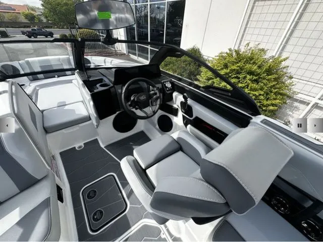 Slide: The Image of Interior of 2025 Malibu Wakesetter 22 MXZ with modern design. - 9