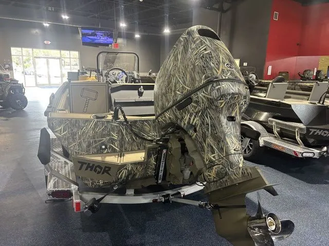 Slide: The Image of Thor Boats 2026 model 1900 Lake Hammer in showroom. - 4