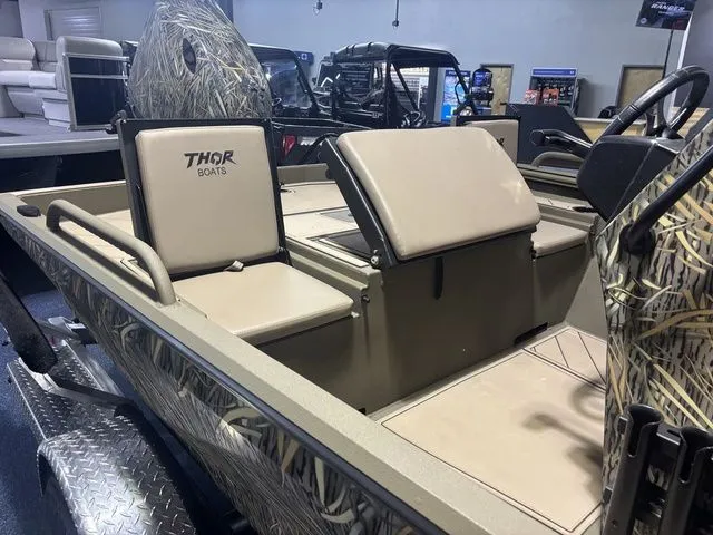 Slide: The Image of 2026 Thor Boats 1900 Lake Hammer interior with beige seating. - 8