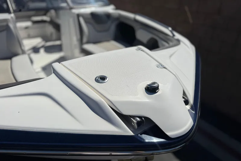 Slide: The Image of 2019 Yamaha Boats 212 Limited S bow detail, showcasing sleek design and craftsmanship. - 12