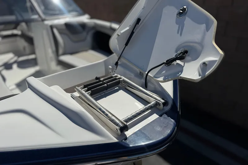 Slide: The Image of 2019 Yamaha Boats 212 Limited S with open swim platform ladder. - 13