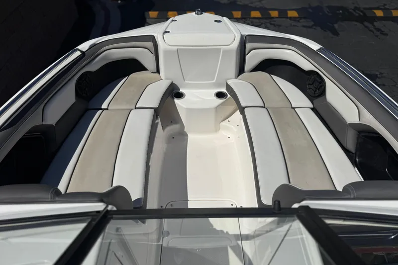 Slide: The Image of 2019 Yamaha Boats 212 Limited S interior with spacious seating and sleek design. - 14