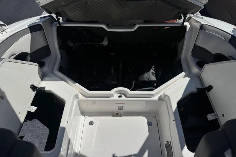 Slide: The Image of Open engine compartment of 2019 Yamaha Boats 212 Limited S, showcasing interior details. - 20