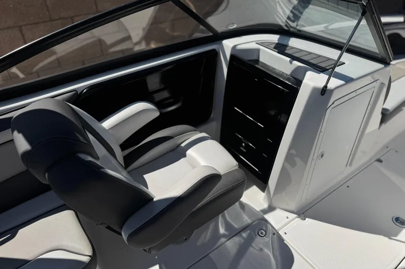Slide: The Image of 2019 Yamaha Boats 212 Limited S interior with sleek seating and modern dashboard design. - 23