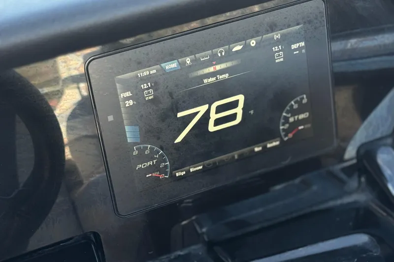 Slide: The Image of Dashboard display of a 2019 Yamaha Boats 212 Limited S showing water temperature. - 30