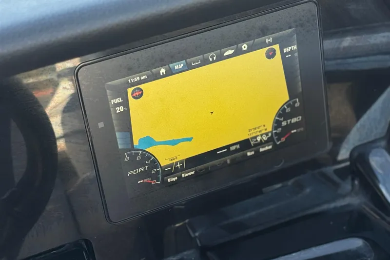Slide: The Image of Dashboard display of a 2019 Yamaha Boats 212 Limited S, showing navigation and fuel data. - 31