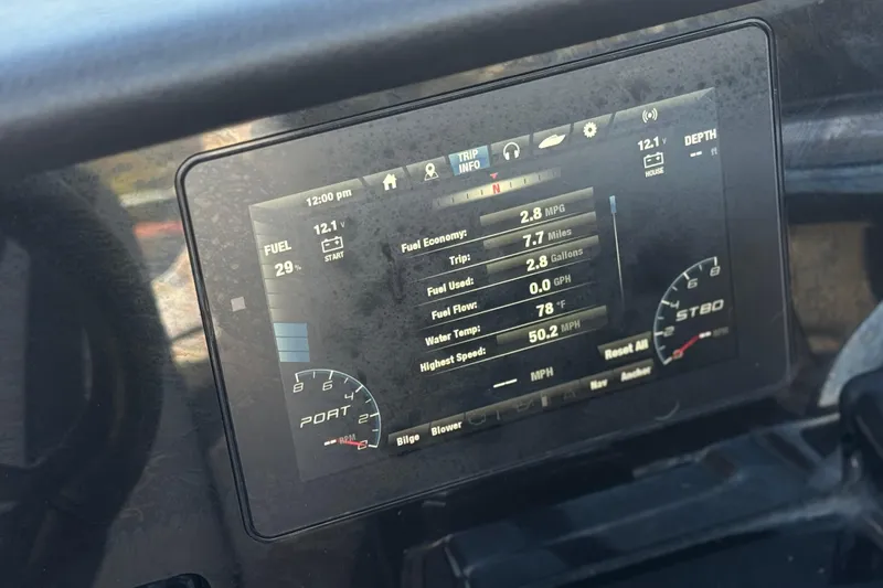Slide: The Image of Dashboard display of a 2019 Yamaha Boats 212 Limited S showing trip information. - 32