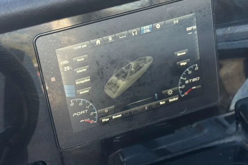 Slide: The Image of Dashboard display of a 2019 Yamaha Boats 212 Limited S showing fuel and system controls. - 33