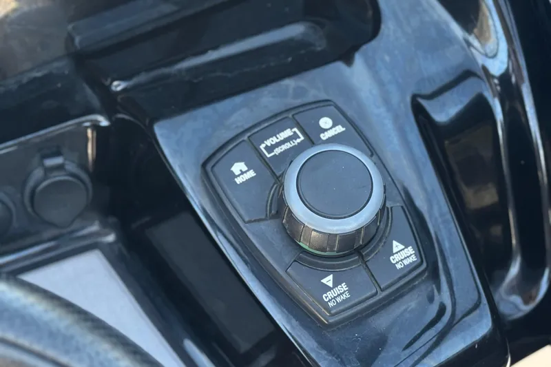 Slide: The Image of Control panel of a 2019 Yamaha Boats 212 Limited S, featuring navigation buttons. - 34