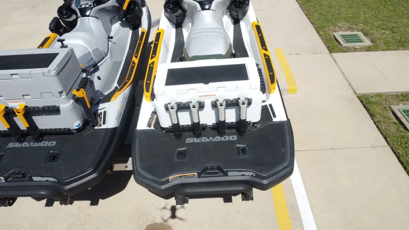 Slide: The Image of 2019 Sea-Doo 14' FISH PRO jet ski parked on concrete surface. - 25