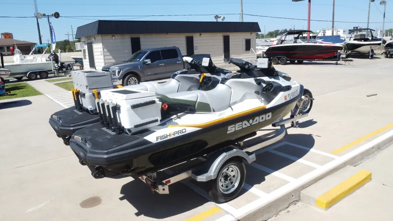 Slide: The Image of 2019 Sea-Doo 14' FISH PRO parked outdoors on a trailer. - 6