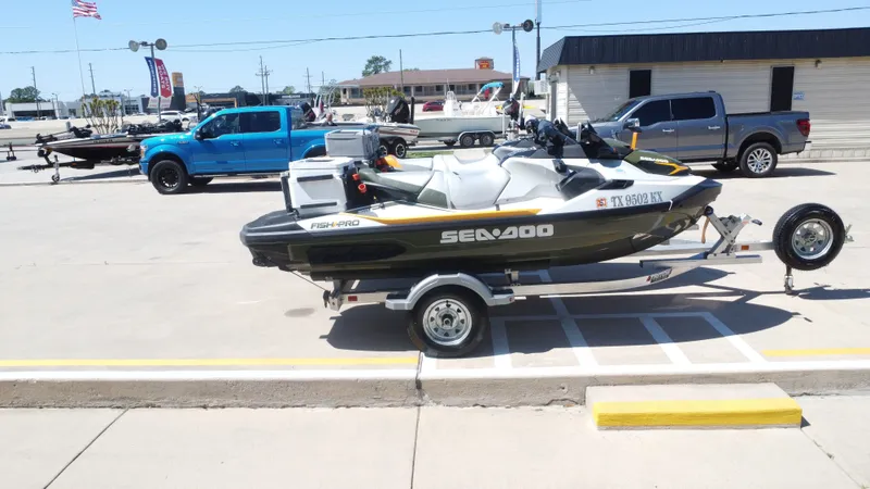 Slide: The Image of 2019 Sea-Doo 14' FISH PRO parked on trailer outdoors. - 7
