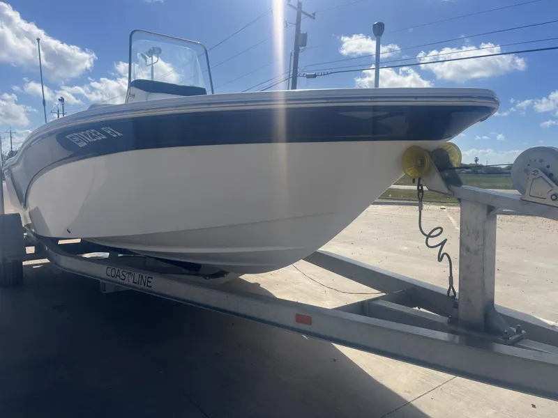 Slide: The Image of 2013 Sea Fox 180XT boat on trailer under sunny sky. - 6