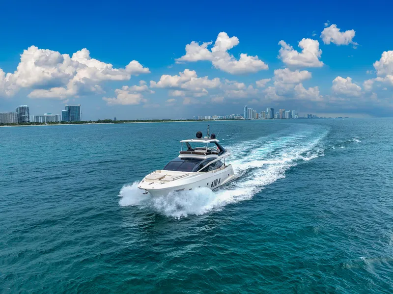 Slide: The Image of Astondoa 72 GLX yacht cruising on blue ocean under clear sky, 2013 model. - 11