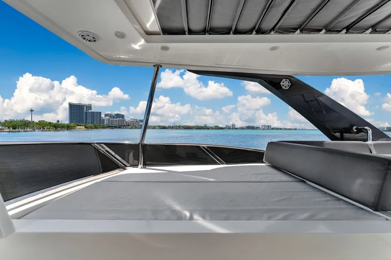 Slide: The Image of Astondoa 72 GLX 2013 yacht deck with ocean view and city skyline. - 31