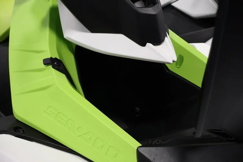 Slide: The Image of 2023 Sea-Doo Spark 3up close-up, featuring vibrant green and black design elements. - 13