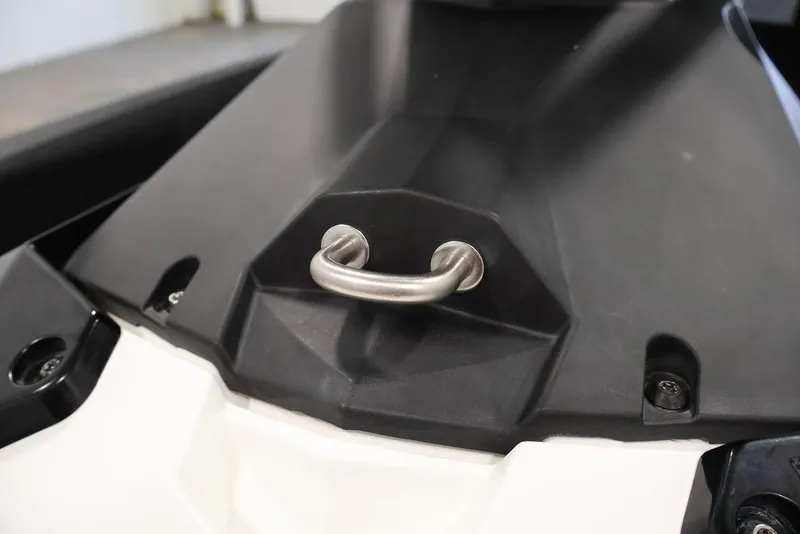 Slide: The Image of 2023 Sea-Doo Spark 3up close-up showing handle detail on black and white body. - 16