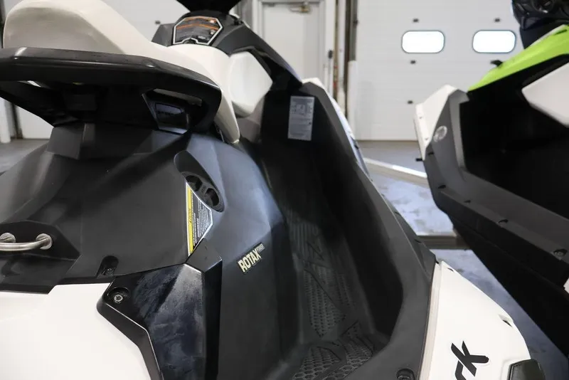 Slide: The Image of 2023 Sea-Doo Spark 3up jet ski interior, showcasing sleek design and Rotax engine. - 17