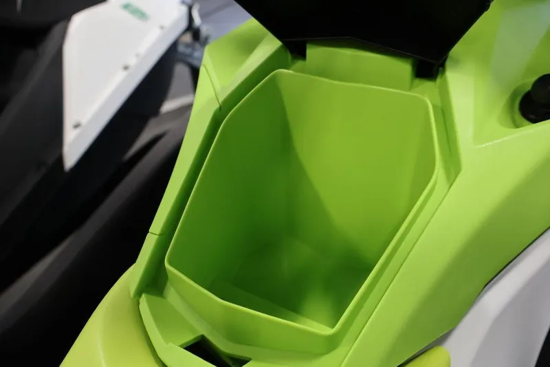 Slide: The Image of 2023 Sea-Doo Spark 3up storage compartment, lime green interior detail. - 20