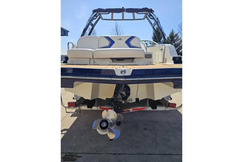 Slide: The Image of 2013 Monterey M3 Sport Boat rear view with propeller and seating area. - 29