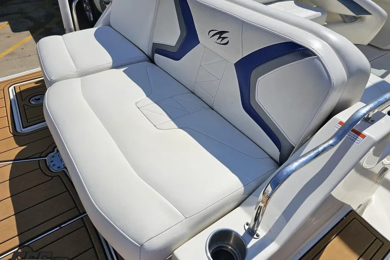 Slide: The Image of White and blue seating on 2013 Monterey M3 Sport Boat deck. - 35