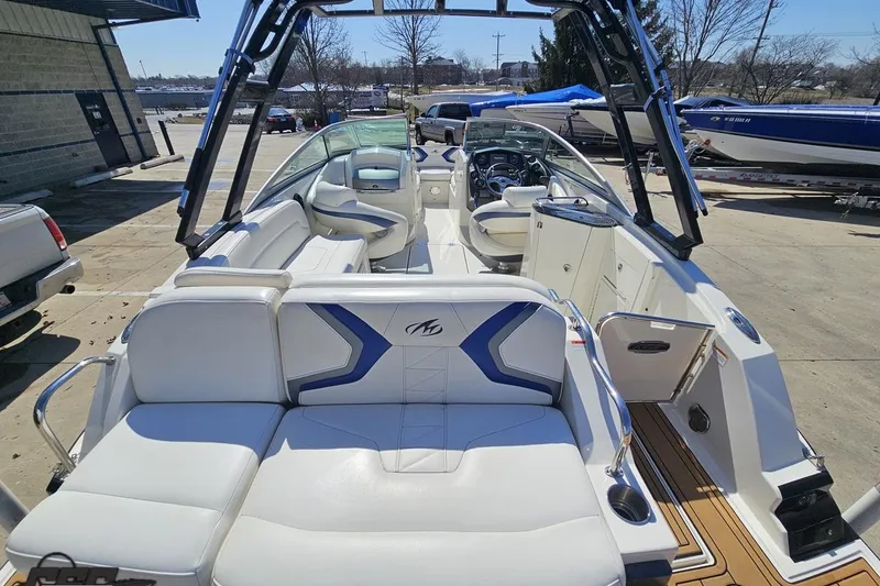 Slide: The Image of 2013 Monterey M3 Sport Boat with white seating and sleek interior design. - 36