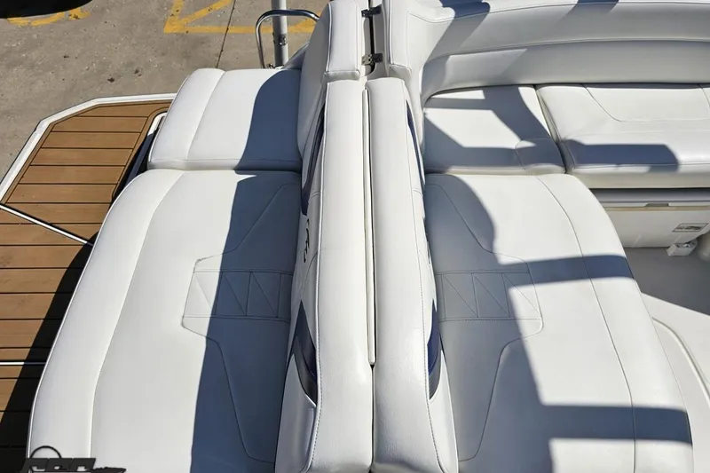 Slide: The Image of 2013 Monterey M3 Sport Boat with white leather seating and wooden deck. - 41