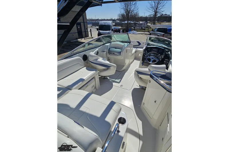 Slide: The Image of 2013 Monterey M3 Sport Boat interior with white seating and modern dashboard. - 42