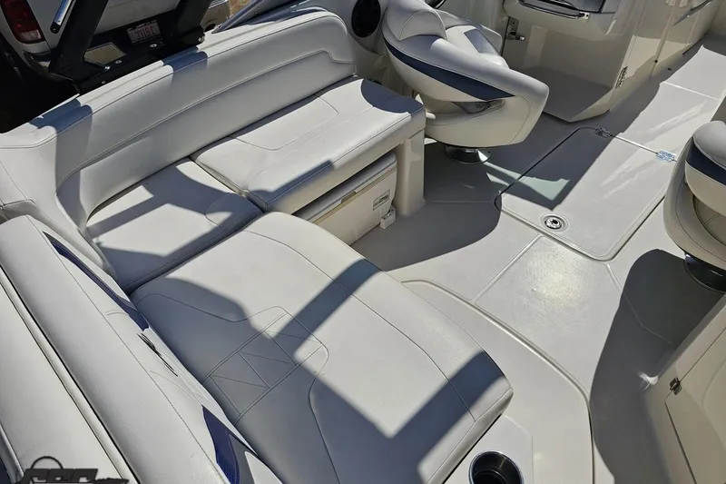 Slide: The Image of Interior of a 2013 Monterey M3 Sport Boat with white leather seating and modern design. - 44
