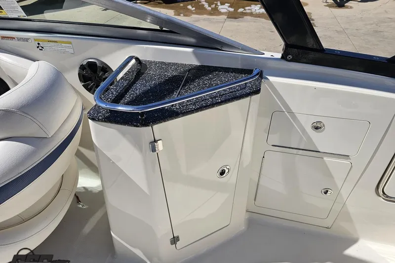 Slide: The Image of 2013 Monterey M3 Sport Boat interior with seating and storage compartments. - 52