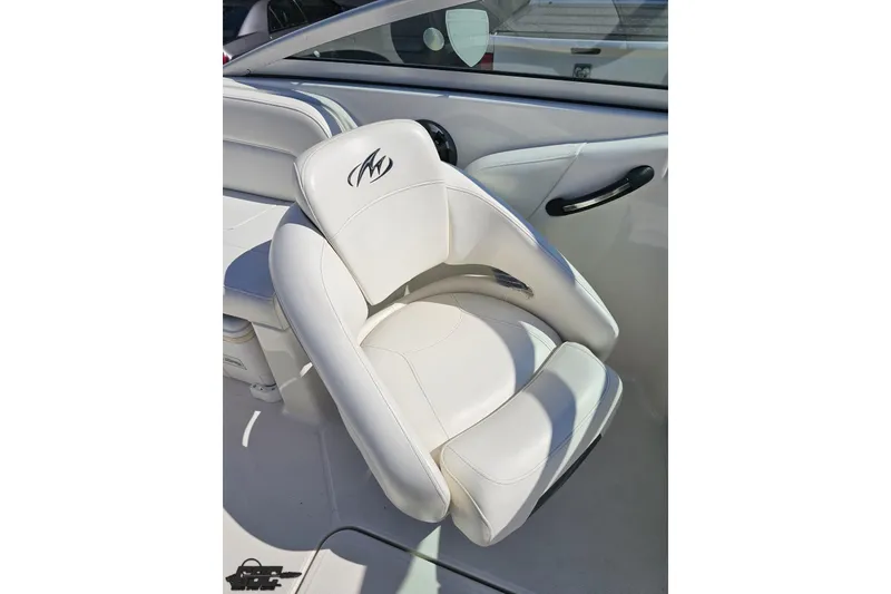 Slide: The Image of White leather seat in 2013 Monterey M3 Sport Boat interior. - 55